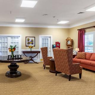 A cozy living room with comfortable seating and warm decor.
