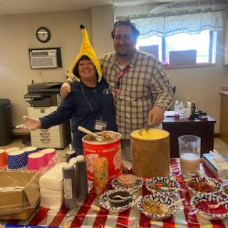 A fun gathering with treats and a banana hat!