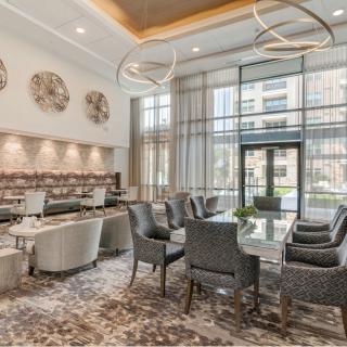 A modern lounge area with elegant furniture and stylish lighting.