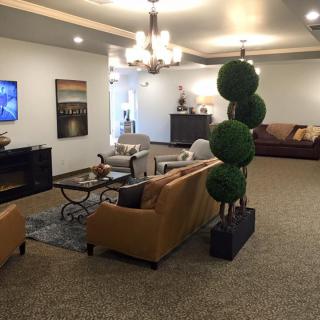 A modern living room with stylish furniture and decor.
