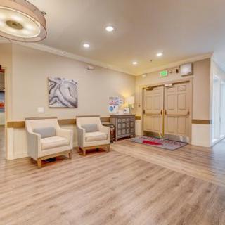 A cozy lobby area with comfortable seating and warm lighting.