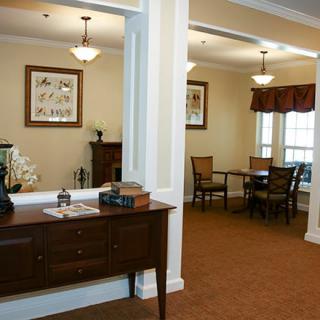 A cozy living room with elegant furniture and tasteful decor.