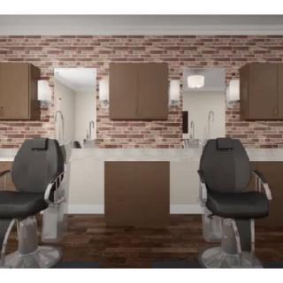 Modern barber shop interior with stylish chairs and mirrors against a brick wall backdrop.