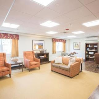 A cozy and inviting lounge area featuring comfortable seating and modern decor.