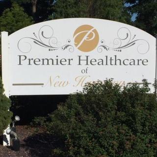 A sign for Premier Healthcare indicating a healthcare facility.