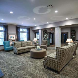 Spacious and elegant lobby with comfortable seating and modern decor.