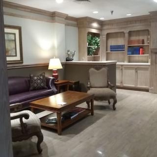 A cozy lobby area with comfortable seating and elegant decor.