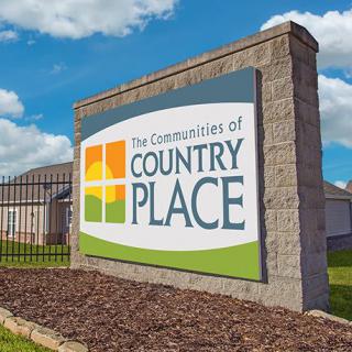 Entrance sign for The Communities of Country Place.