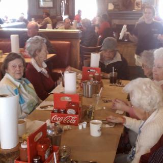 A group of people dining together at a restaurant.
