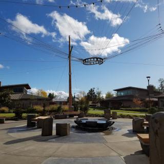 A serene outdoor recreational area with clear skies and a modern design.