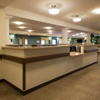 A spacious and well-lit reception area with a modern design.