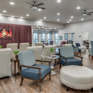 A modern lounge with comfortable seating and stylish decor.