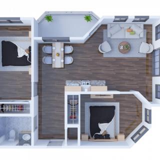 A detailed floor plan of an apartment showcasing two bedrooms, a dining area, and a living room.