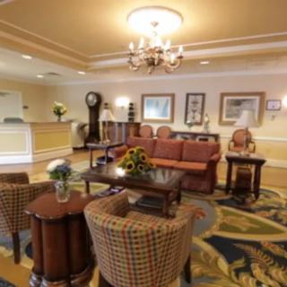 A cozy lobby area with comfortable seating and elegant decor.