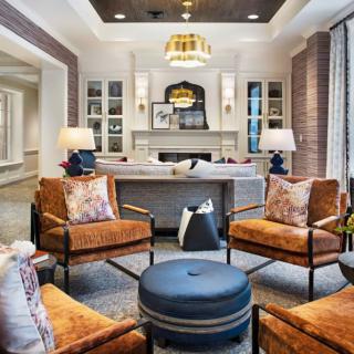 A stylish and cozy living room with modern furniture and elegant decor.
