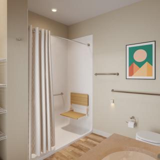 A modern and accessible bathroom featuring a shower with a foldable chair, grab bars for safety, and minimalist wall art.