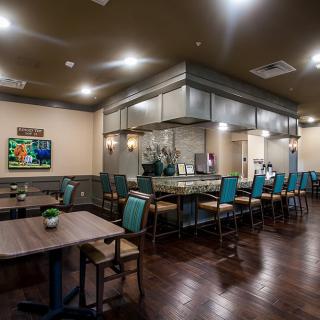 Modern restaurant interior with a spacious dining area and stylish decor.