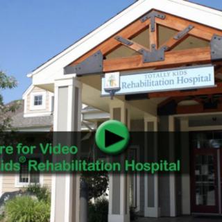 Entrance to a rehabilitation hospital with visible signage.