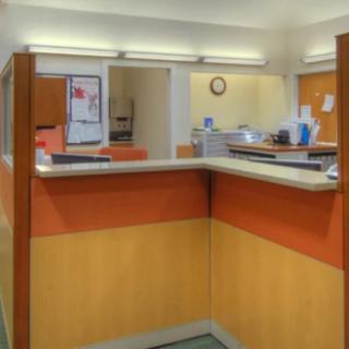 Interior view of a bank teller counter area.