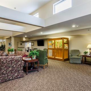 A cozy living room area with comfortable seating and tasteful decor.