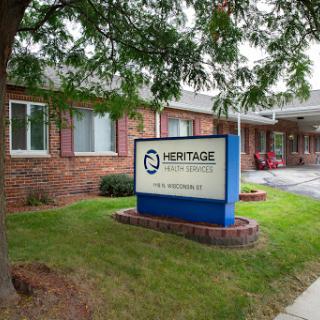 Heritage Health Services facility with a well-maintained exterior and signage.