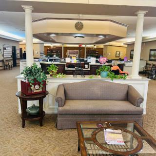 A welcoming lobby area featuring comfortable seating and decorative plants.