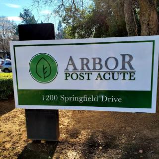 Sign for Arbor Post Acute healthcare facility located at 1200 Springfield Drive.