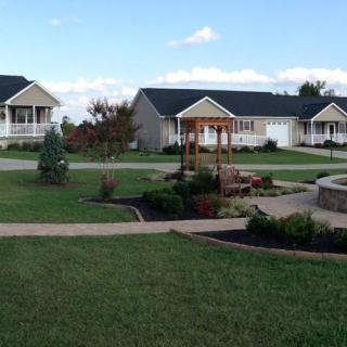A peaceful suburban neighborhood featuring well-maintained gardens and walkways.