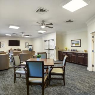 A spacious living area with comfortable seating and modern furnishings.