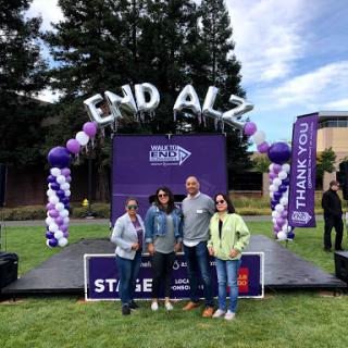 Participants gathering to support Alzheimer's awareness at a community event.