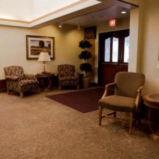 A cozy waiting area with comfortable seating and tasteful decor.