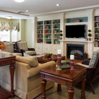 A cozy living room with elegant furniture and a warm ambiance, ideal for relaxation and gatherings.