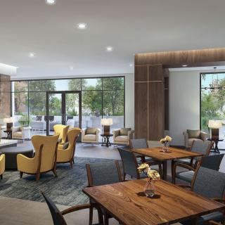 A modern lobby with comfortable seating and natural lighting.
