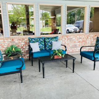 A cozy outdoor seating arrangement perfect for relaxation.