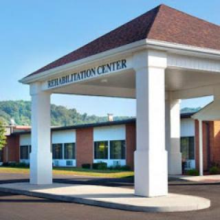 Entrance of a healthcare facility with a welcoming design.