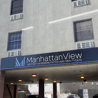 View of the Manhattan View building showcasing its exterior signage.