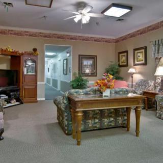 A cozy living room with comfortable seating and elegant decor.