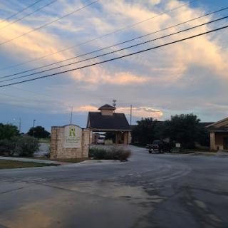 A welcoming entrance with a picturesque sky at dusk.