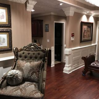 A cozy living room with classic furniture and elegant decor.
