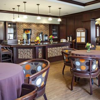 A modern cafe interior with stylish decor and comfortable seating.