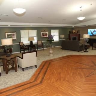 Spacious living room with comfortable seating and elegant decor.