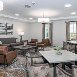 A contemporary living room with modern furniture and stylish decor.