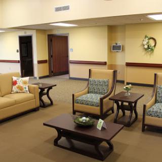 A cozy and inviting lobby area with comfortable seating, perfect for relaxation or waiting.