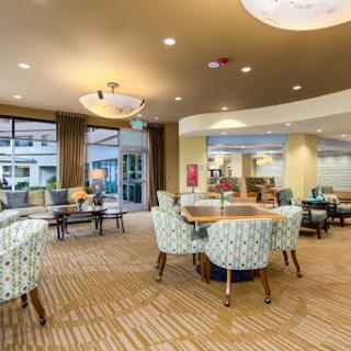 A modern lobby with comfortable seating and vibrant decor.