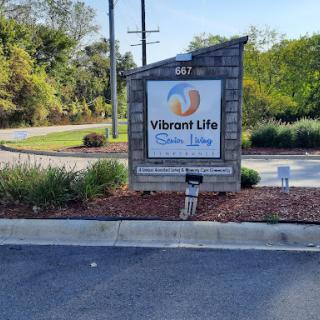 Welcome sign for Vibrant Life Community Living, showcasing a welcoming entrance.