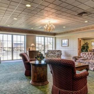 A cozy lobby interior with comfortable seating and elegant lighting.