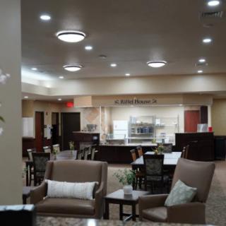 A modern lobby with comfortable seating and elegant lighting.