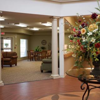 A welcoming lobby with elegant decor and a seating area.