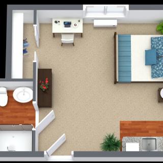 A digital floor plan of a small apartment featuring a bedroom, bathroom, and living area.