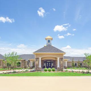 A welcoming entrance to a beautifully designed residential building.